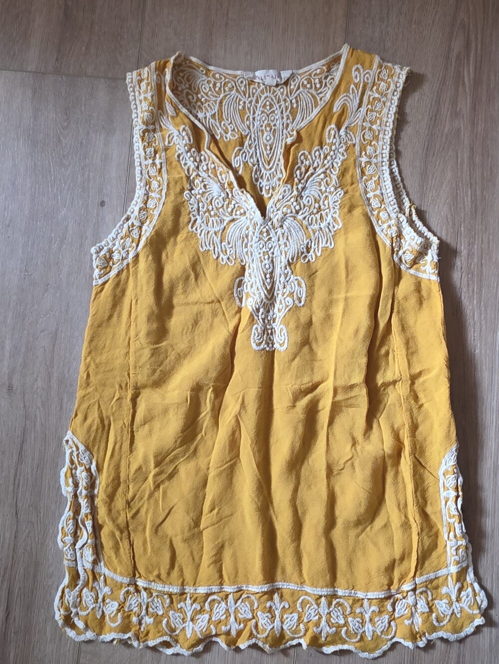 Solitaire sleeveless mustard yellow boho blouse